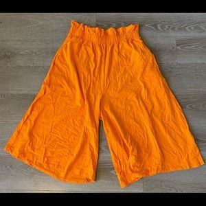 Orange calf length shorts
